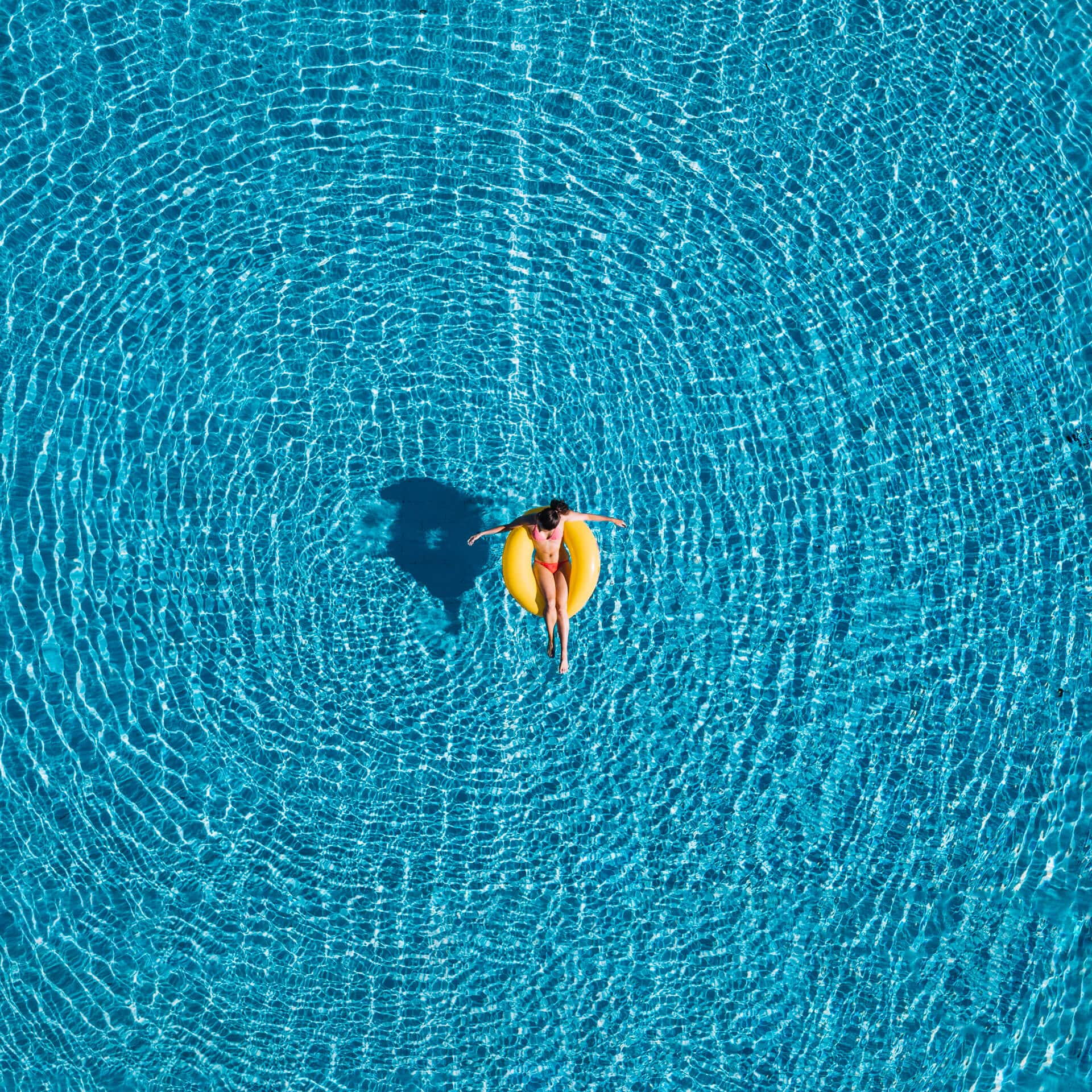 top-view-girl-relaxing-inflatable-ring_edited